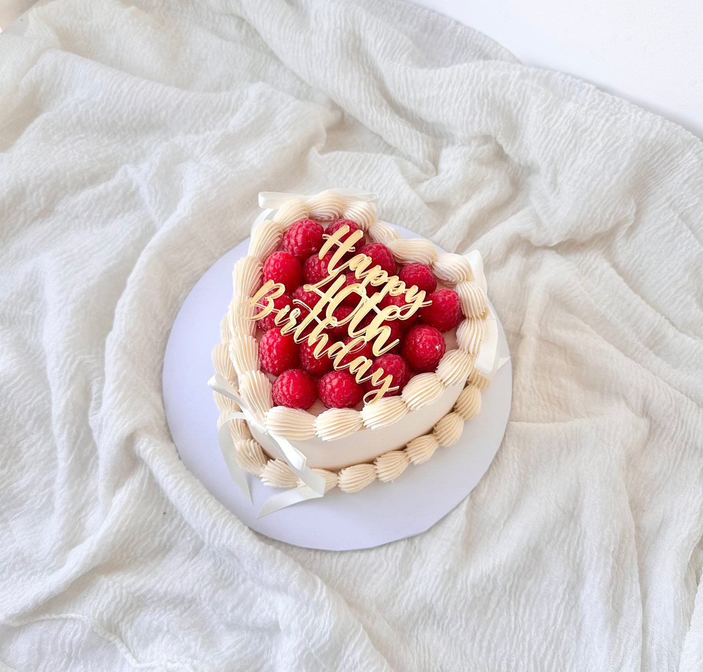 Raspberry topped cake