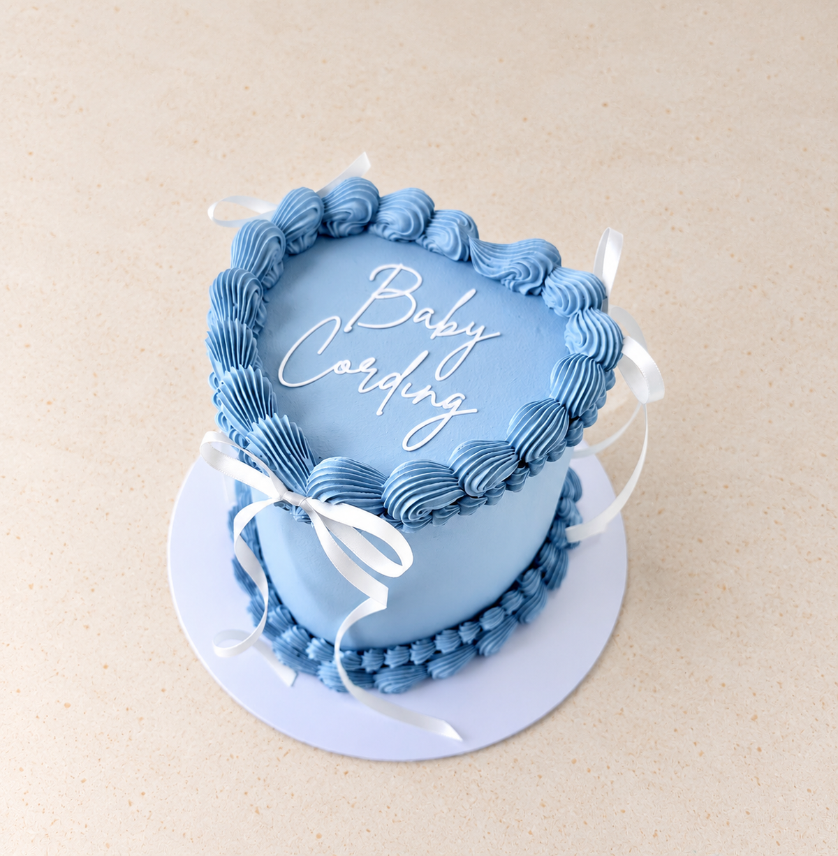 Classic bow heart cake