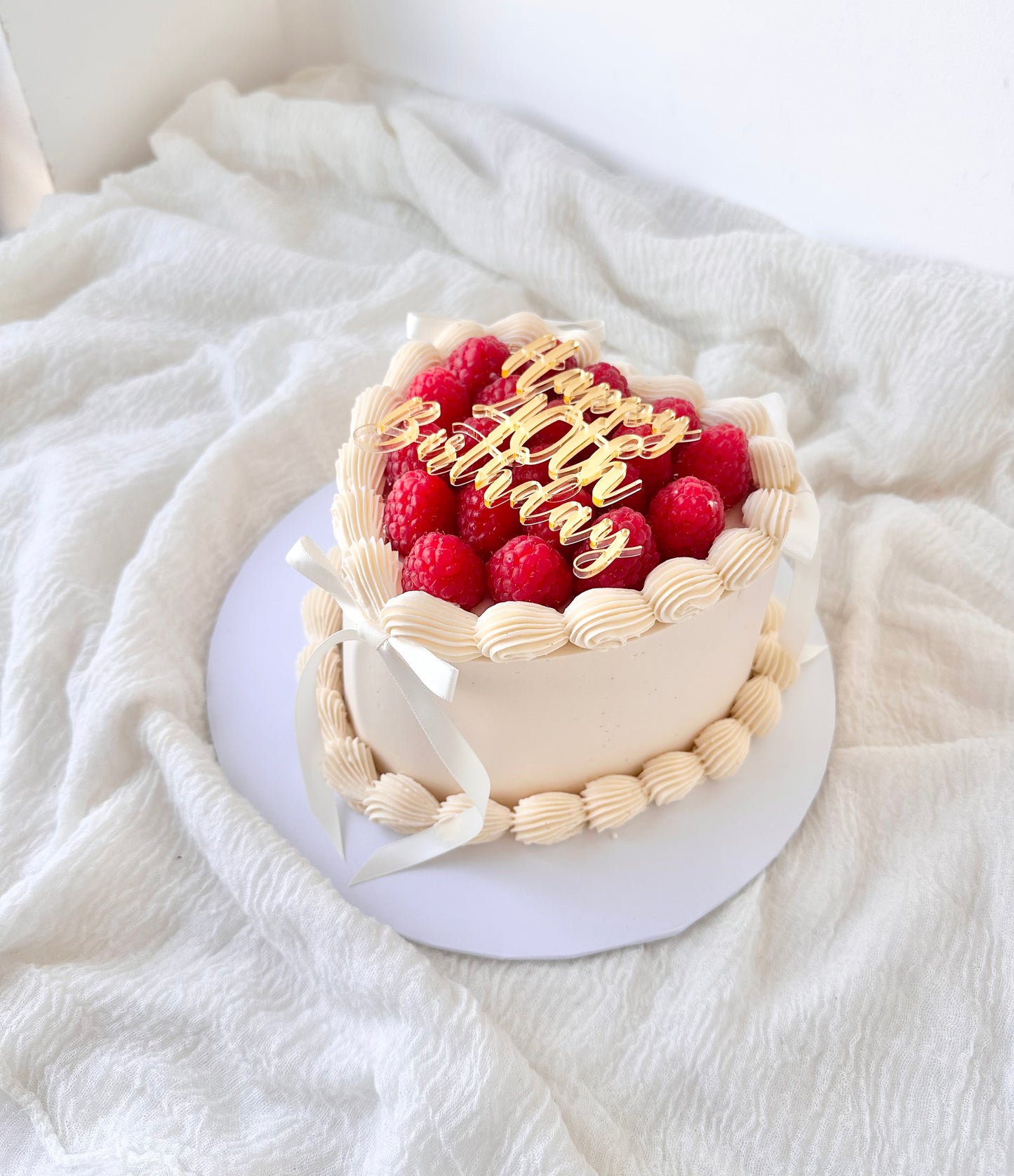 Raspberry topped cake